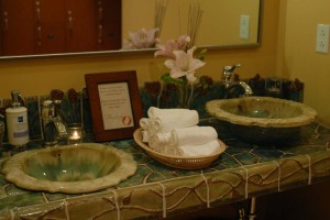 Handcrafted sink and vanity area at Rasa Spa